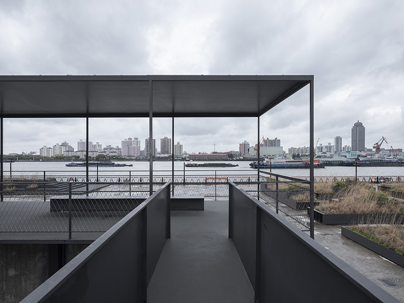 atelier deshaus transforms abandoned coal-unloading wharf into riverside passage in shanghai