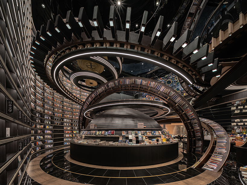 colossal celestial rings enliven x+living's futuristic bookstore in jiangsu, china