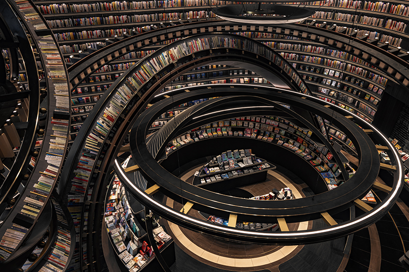 colossal celestial rings enliven x+living's futuristic bookstore in jiangsu, china