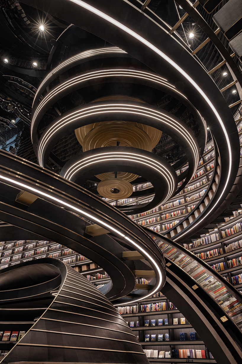 colossal celestial rings enliven x+living's futuristic bookstore in jiangsu, china