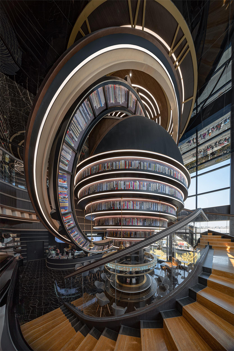 colossal celestial rings enliven x+living's futuristic bookstore in jiangsu, china