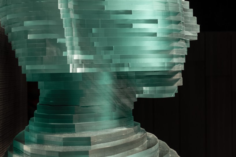 4.5-meter-tall glass-hewn buddha sculpture decorates restaurant interior by YOD group in new york