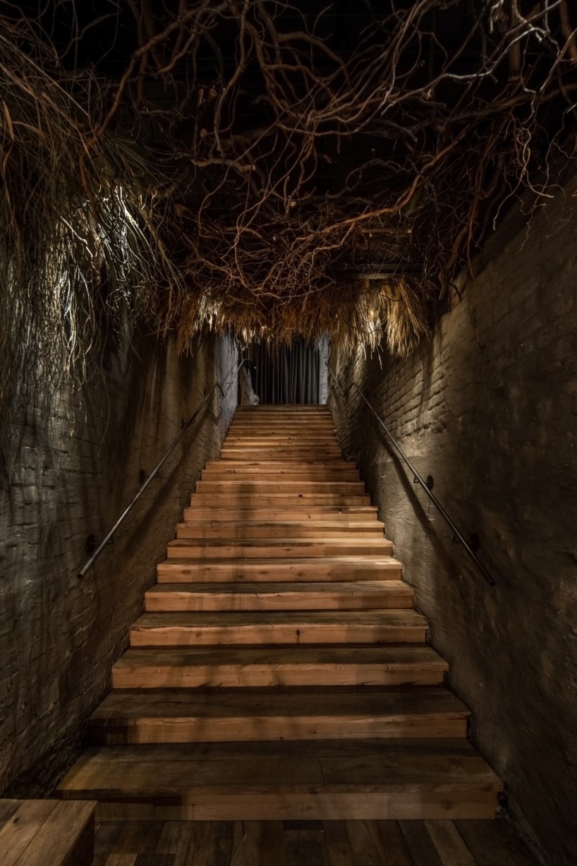 yod group designed a bar with roots on the ceiling that locates under the flower shop 1
