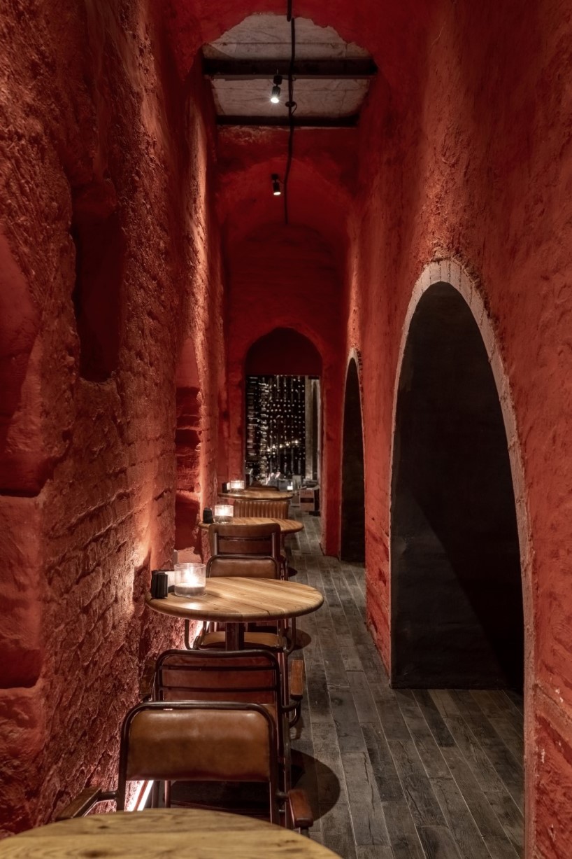 yod group designed a bar with roots on the ceiling that locates under the flower shop 6