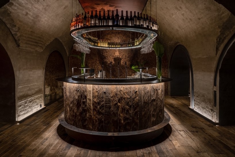 yod group designed a bar with roots on the ceiling that locates under the flower shop 9