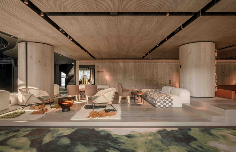 YOD group suspends sycamore tree installation to illuminate grand hotel atrium in ukraine