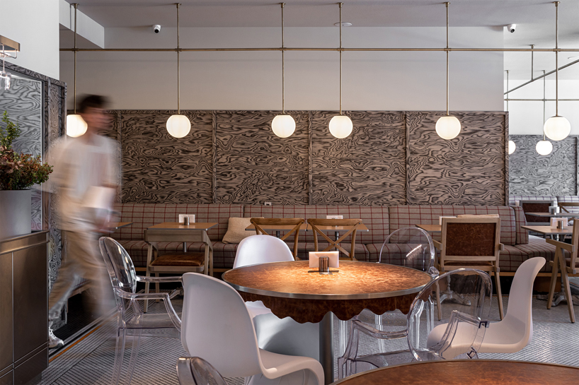 mosaics, check patterns, and textured veneers clad YOD group's modern italy-inspired bistro