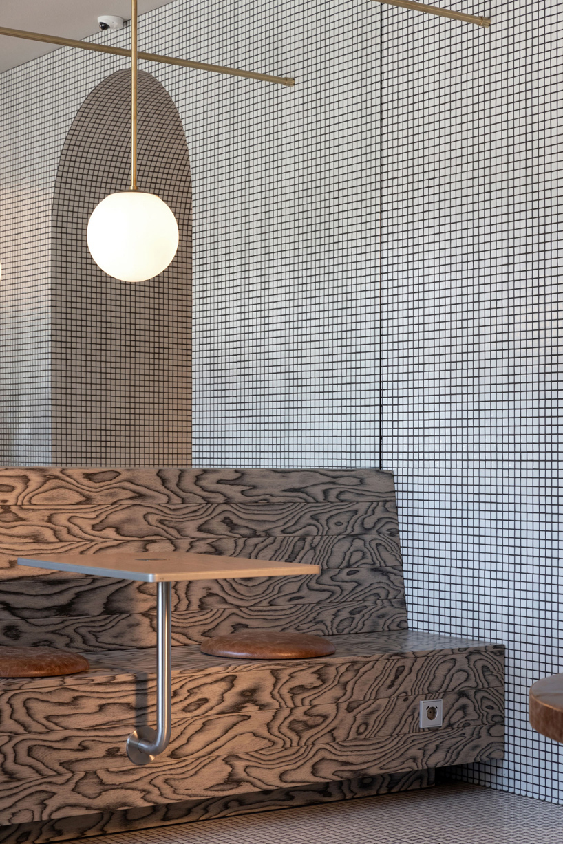 mosaics, check patterns, and textured veneers clad YOD group's modern italy-inspired bistro