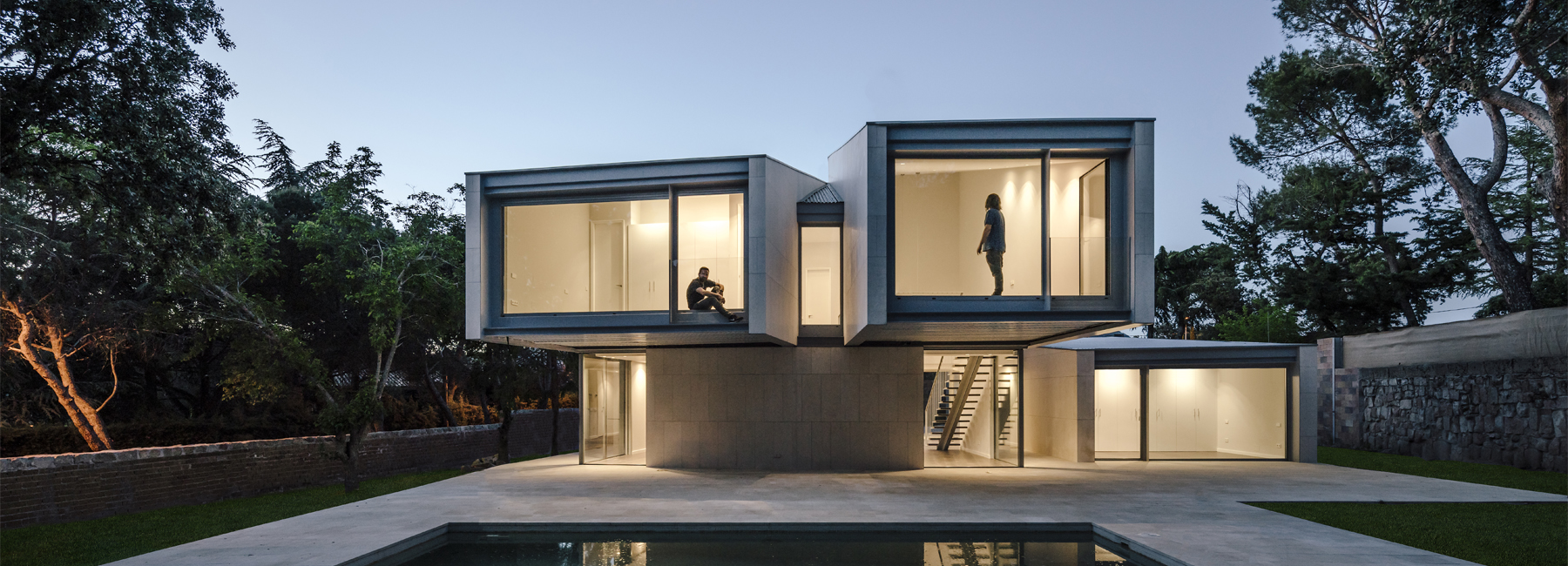 zooco estudio articulates casa M4 with three limestone volumes in madrid