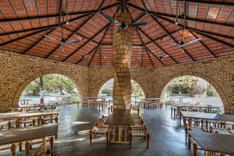 d6thd design studio grows triangular cottages among old mango trees in india 8