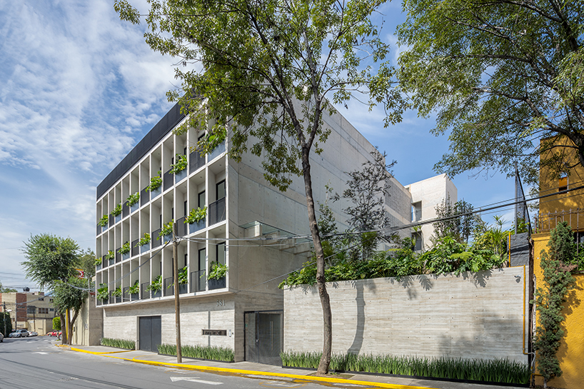 HGR arquitectos designs building with circular courtyard as new housing alternative