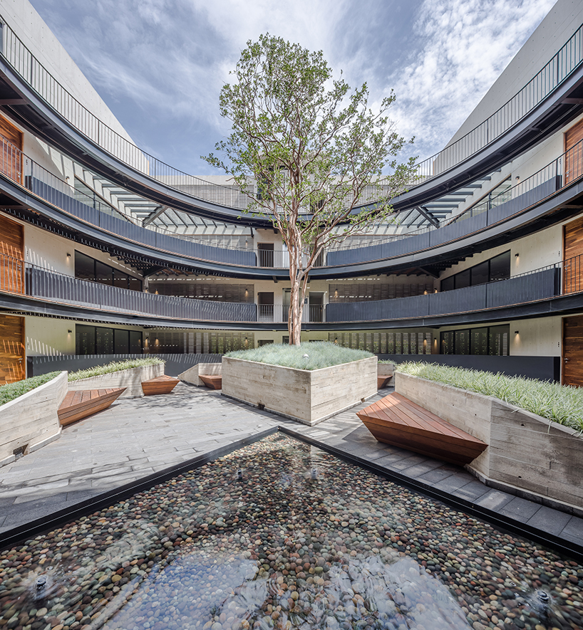 HGR arquitectos designs building with circular courtyard as new housing alternative