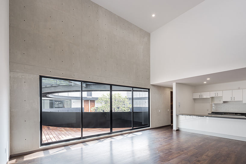 HGR arquitectos designs building with circular courtyard as new housing alternative