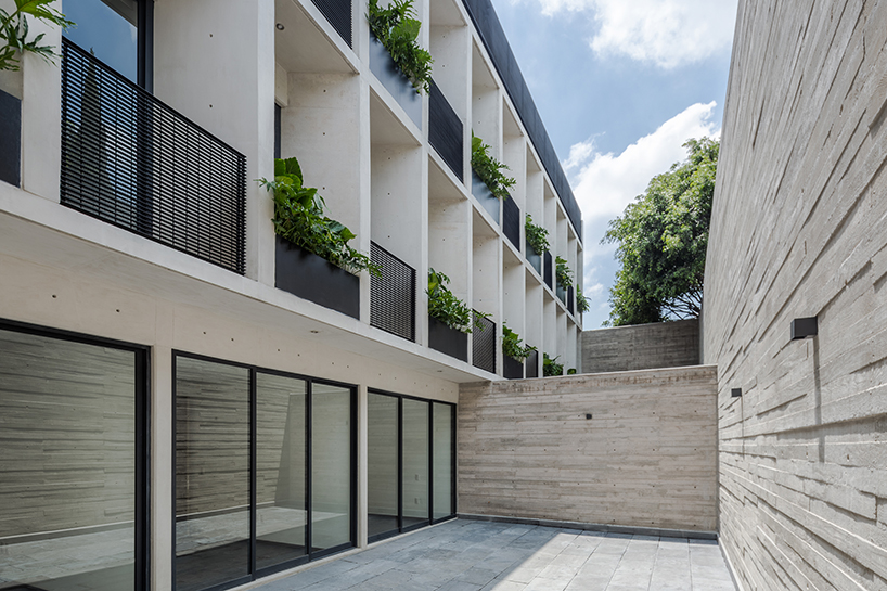 HGR arquitectos designs building with circular courtyard as new housing alternative