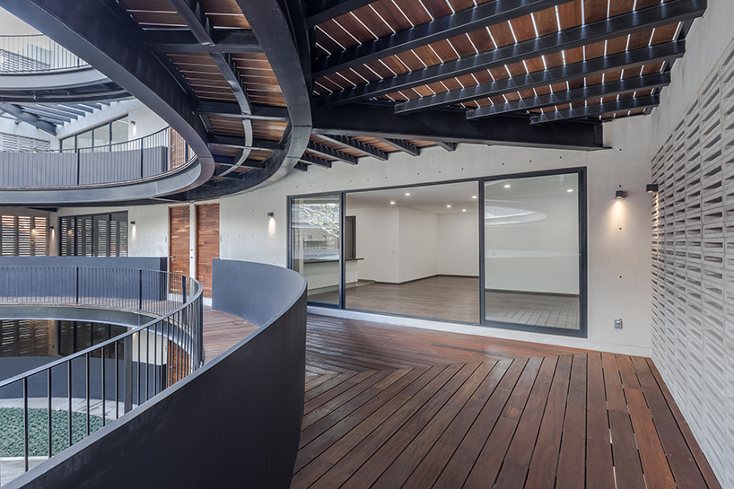 HGR arquitectos designs building with circular courtyard as new housing alternative