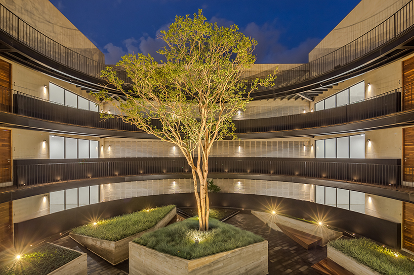 HGR arquitectos designs building with circular courtyard as new housing alternative
