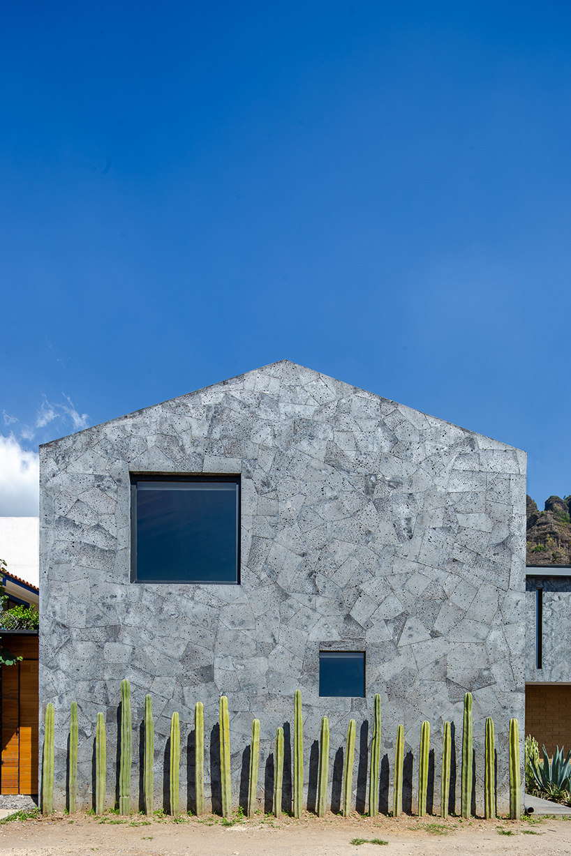 HGR arquitectos uses stone clad volumes to form 'casa texcal' within mexican countryside