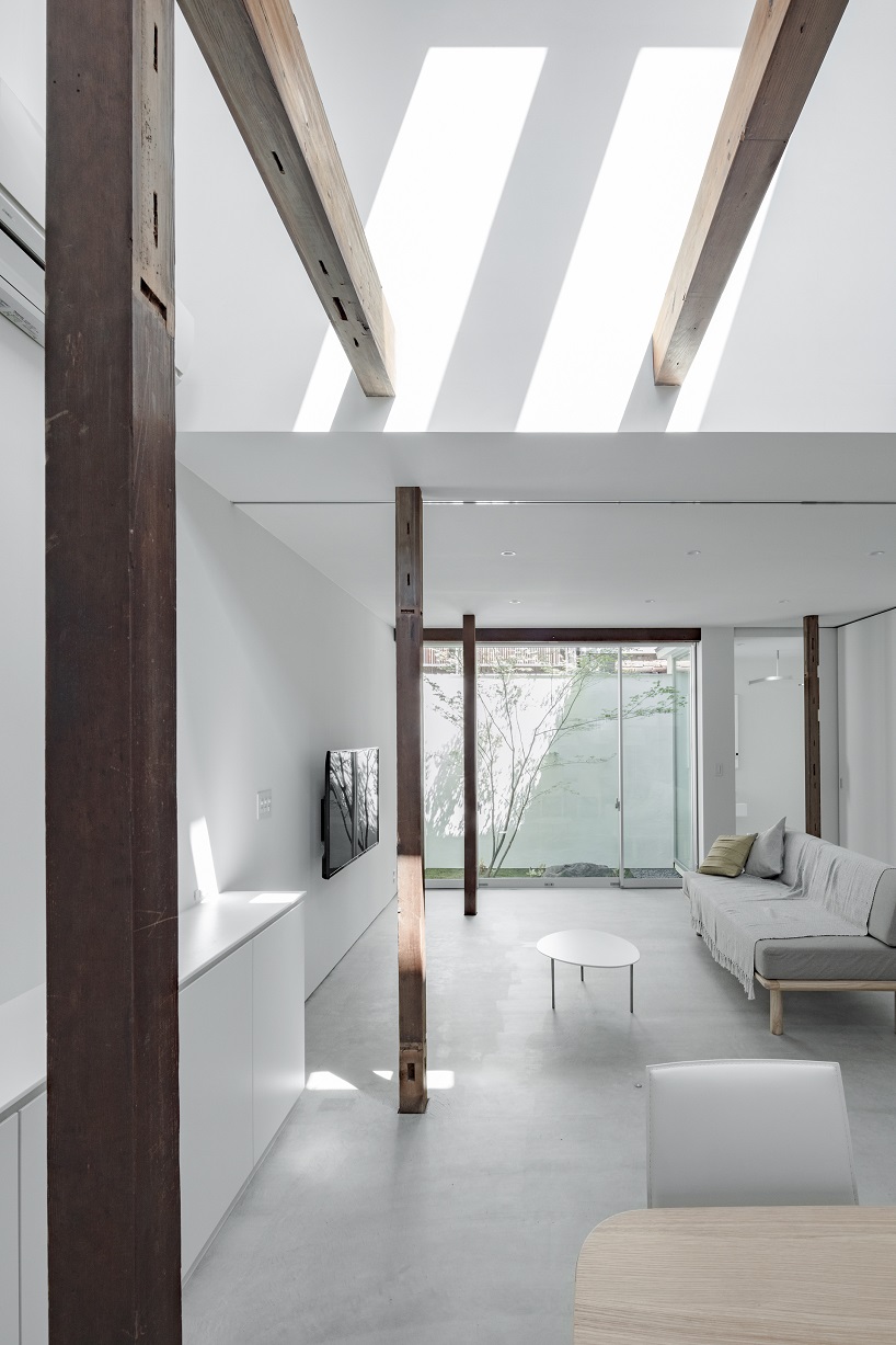 kooo architects renovates traditional machiya house in kyoto with white-hued interiors