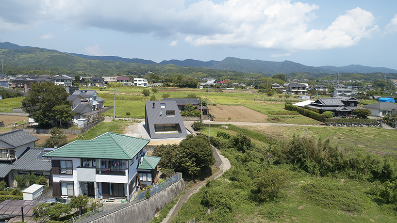 kenta eta's 'house usuki' in japan has sloped roof you can sit on and admire the view