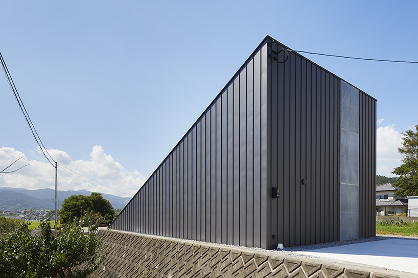 kenta eta's 'house usuki' in japan has sloped roof you can sit on and admire the view