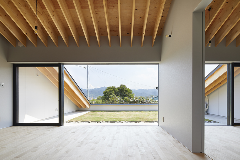 kenta eta's 'house usuki' in japan has sloped roof you can sit on and admire the view