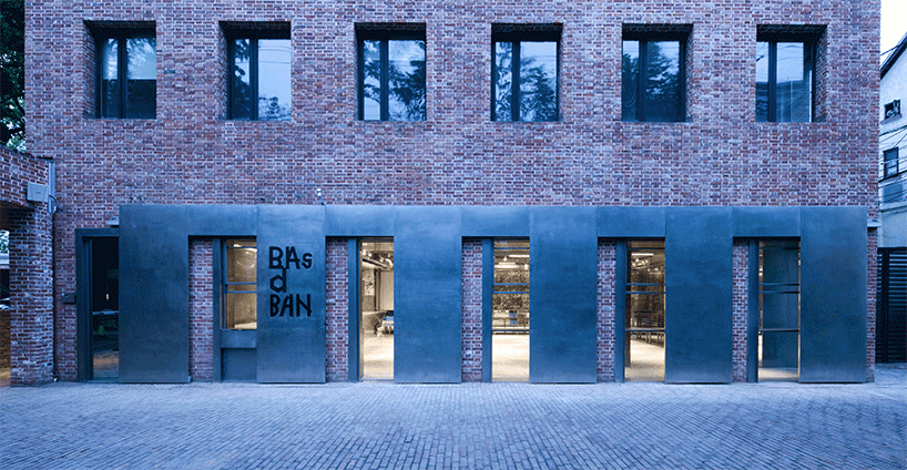 steel counters, concrete walls + metal curtain partitions realize 'basdban' café in shanghai