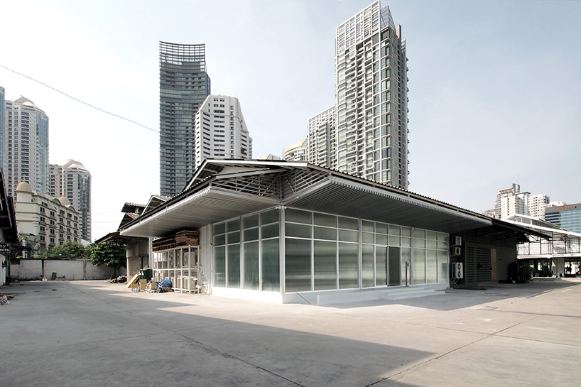 ASWA uses rippled glazing to convert a former warehouse into a new office in bangkok designboom