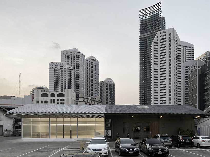 ASWA uses rippled glazing to convert a former warehouse into a new office in bangkok designboom