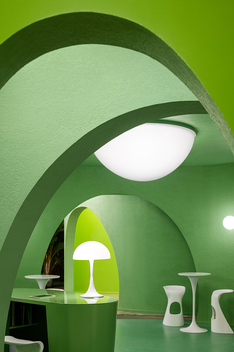 bright green walls and organic shapes form 'space age' styled hair salon by fabrizio gurrado in beijing