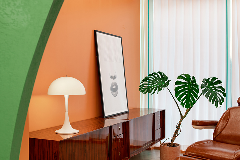 bright green walls and organic shapes form 'space age' styled hair salon by fabrizio gurrado in beijing