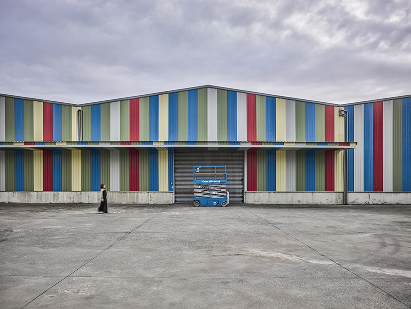 waterfrom uses transparent plastic sheets and mesh to renovate 30-year old factory