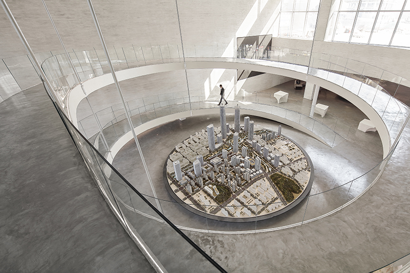 waterfrom design forms sweeping organic curves for art space in china