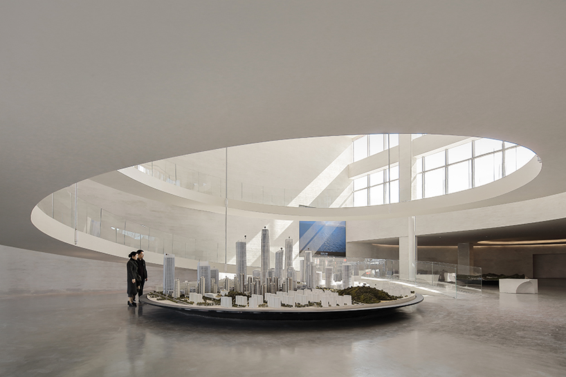 waterfrom design forms sweeping organic curves for art space in china