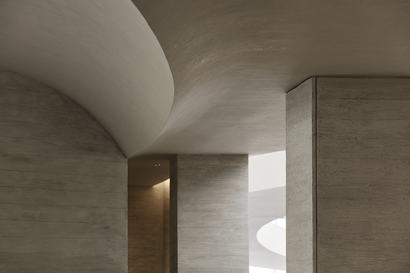 waterfrom design forms sweeping organic curves for art space in china
