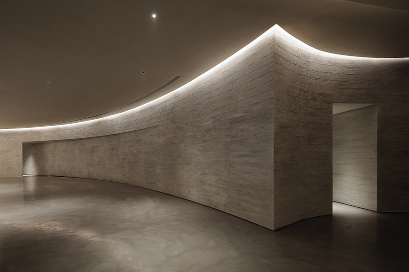 waterfrom design forms sweeping organic curves for art space in china