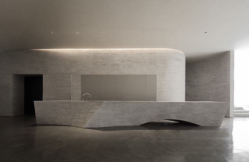 waterfrom design forms sweeping organic curves for art space in china