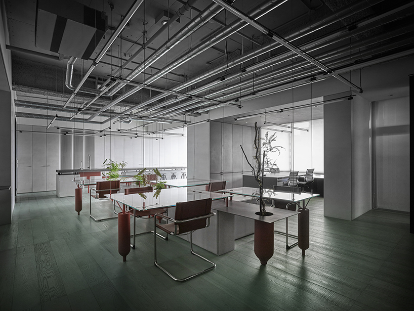 waterfrom design repurposes gas cylinders to create industrial office in taiwan designboom