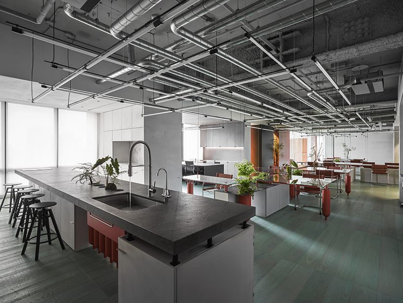 waterfrom design repurposes gas cylinders to create industrial office in taiwan designboom