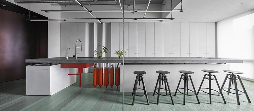 waterfrom design repurposes gas cylinders to create industrial office in taiwan designboom
