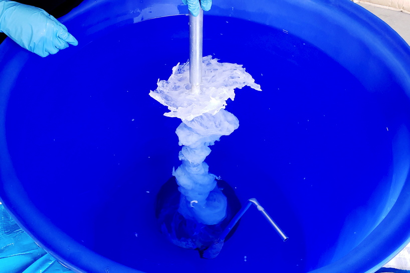 we+ captures the shape of a water vortex to create the 'swirl' light fixture designboom