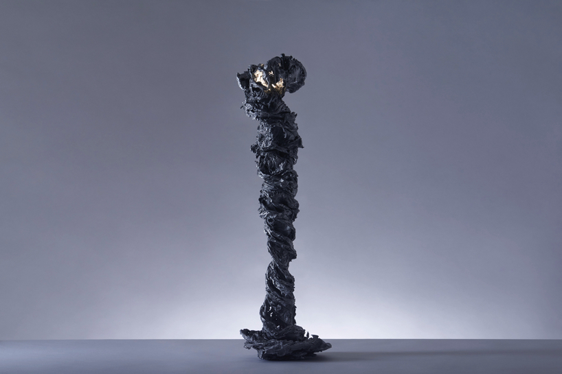 we+ captures the shape of a water vortex to create the 'swirl' light fixture designboom