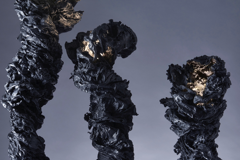 we+ captures the shape of a water vortex to create the 'swirl' light fixture designboom