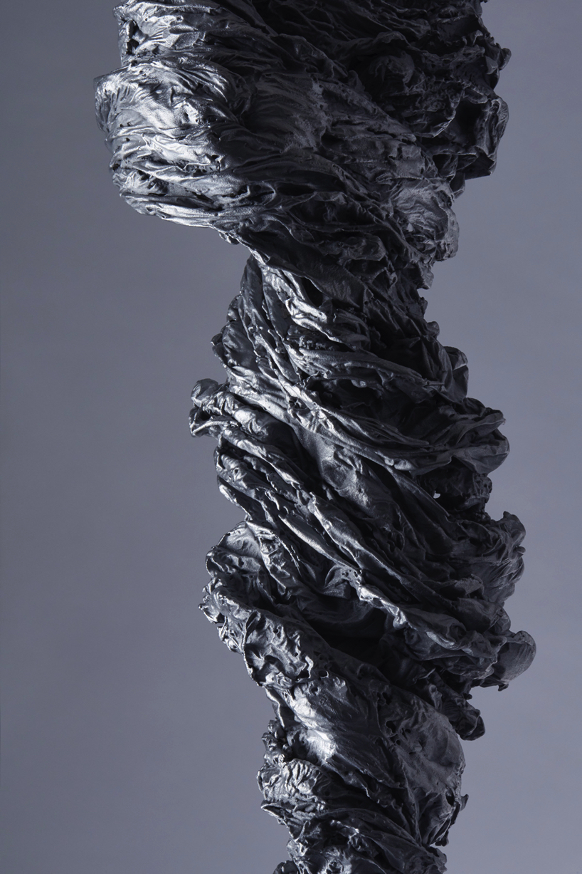 we+ captures the shape of a water vortex to create the 'swirl' light fixture designboom