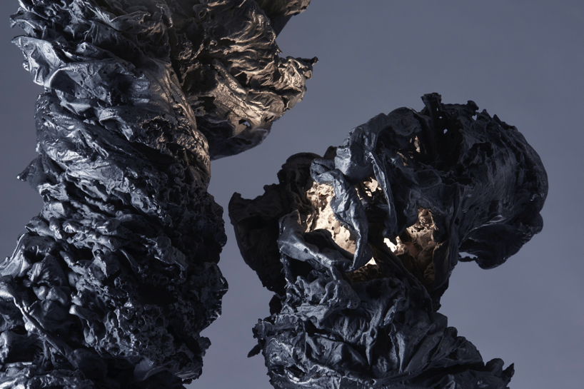 we+ captures the shape of a water vortex to create the 'swirl' light fixture designboom