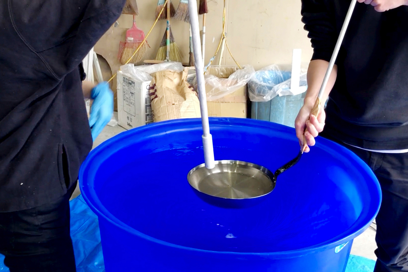 we+ captures the shape of a water vortex to create the 'swirl' light fixture designboom