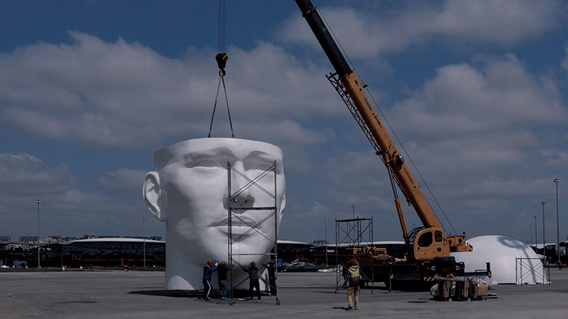 jody xiong clads interior of 12 meter-high head installation in thousands of prisms