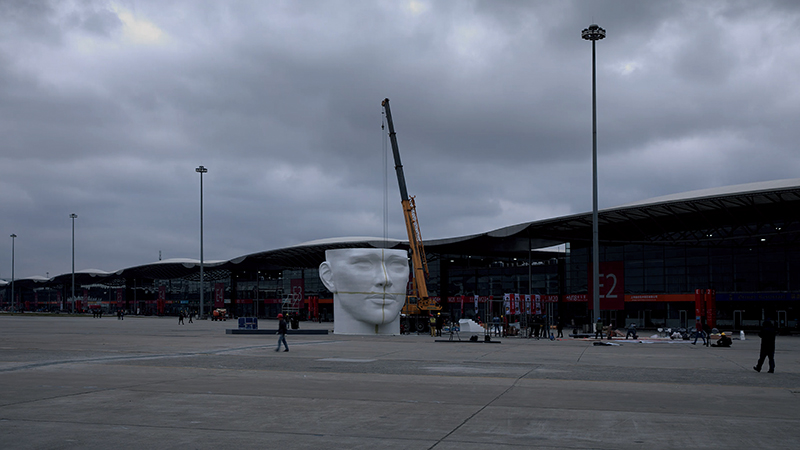 jody xiong clads interior of 12 meter-high head installation in thousands of prisms