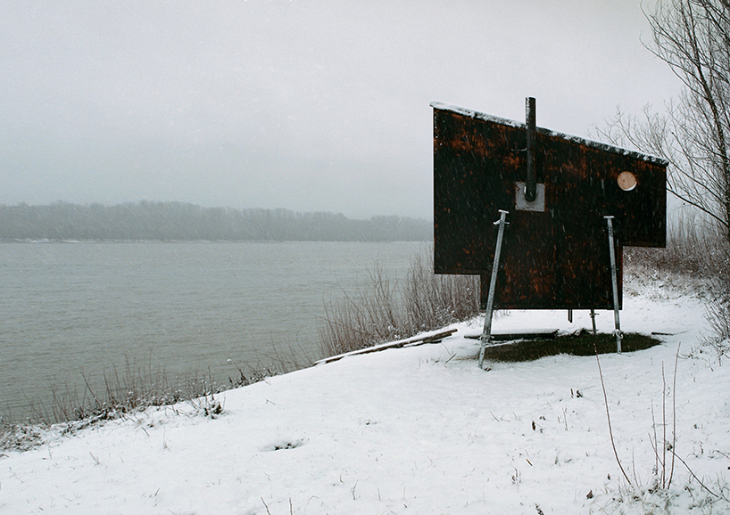 mobile sauna by BIVAK perches on recycled wooden stilts for an exclusive retreat
