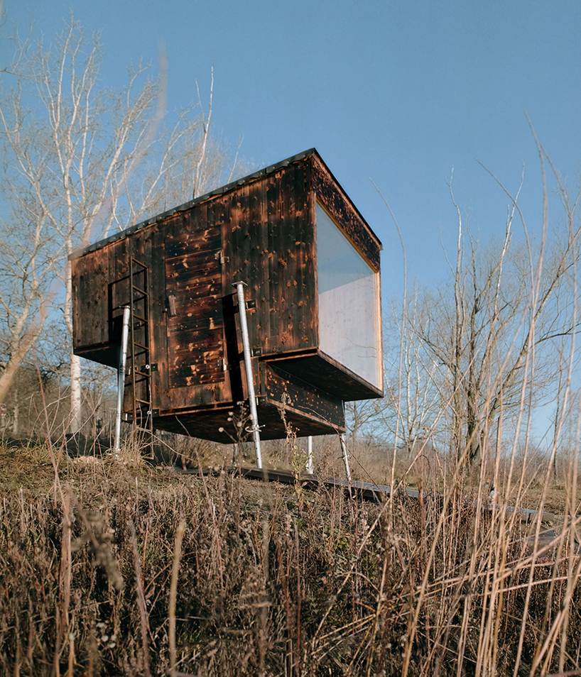 mobile sauna by BIVAK perches on recycled wooden stilts for an exclusive retreat
