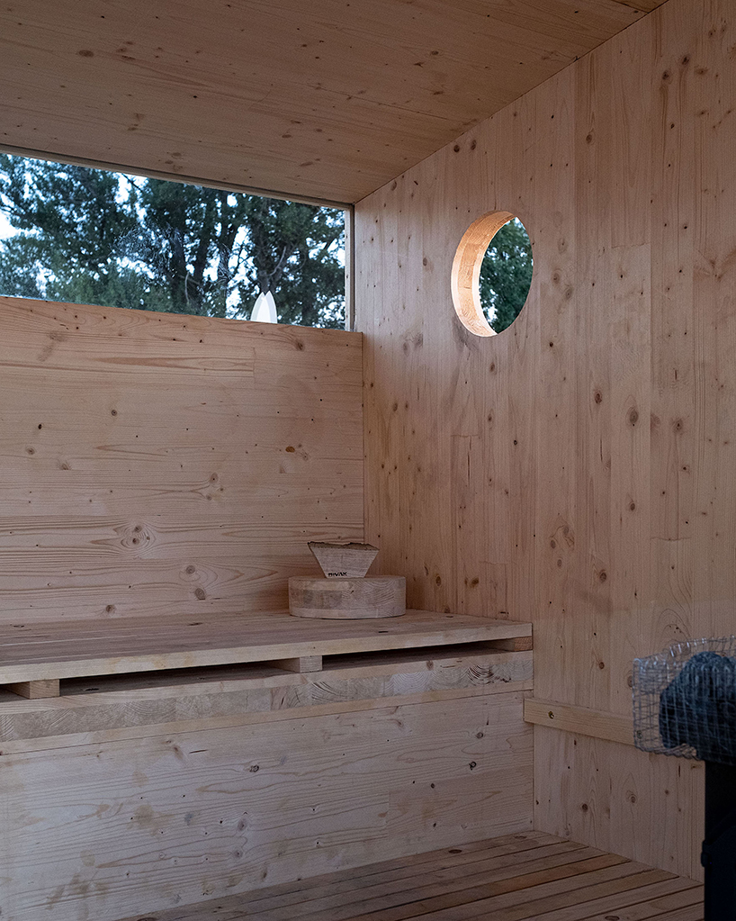 mobile sauna by BIVAK perches on recycled wooden stilts for an exclusive retreat